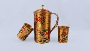 P. Set Of Golden Flower Printed Copper Jug 1.5L And 2 Matching Copper Glasses